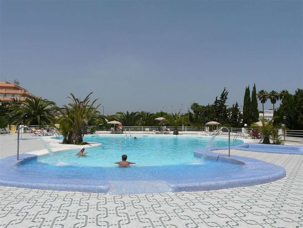 Een foto van het zwembad bij Playa Blanca Hotel