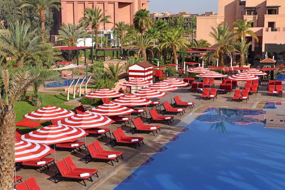 Een foto van het zwembad bij Mövenpick Hotel Mansour Eddahbi Marrakech