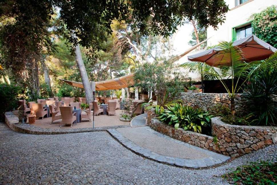 Een foto van het terras bij Hotel Lago Garden Suites & Spa