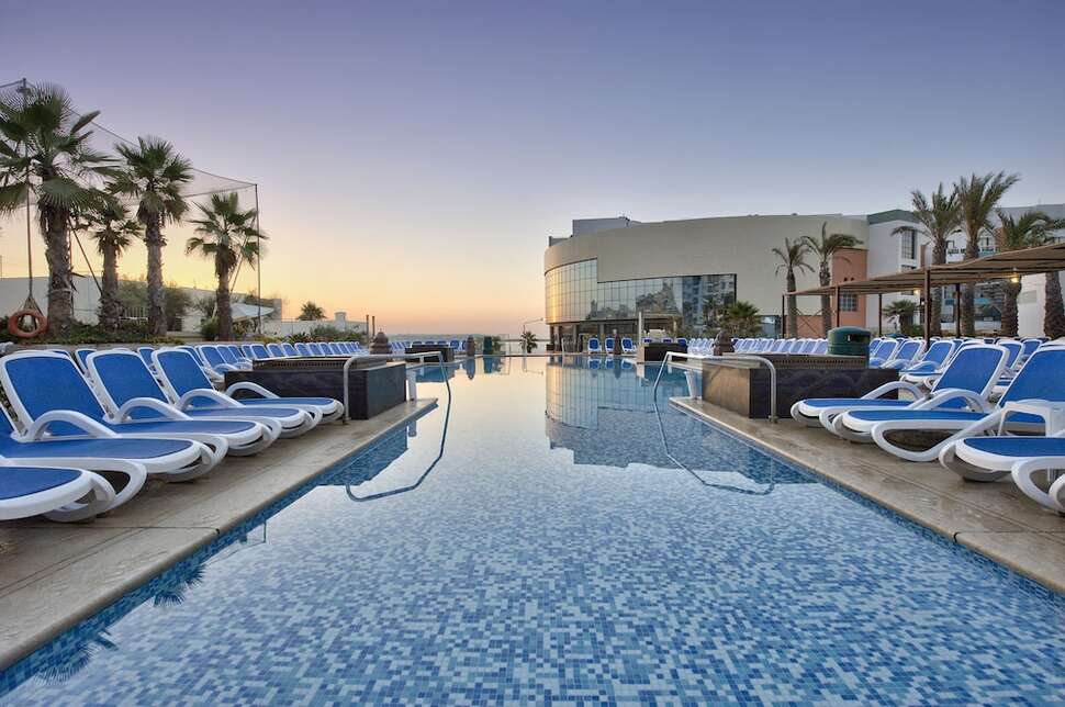 Een foto van het zwembad bij db San Antonio Hotel & Spa