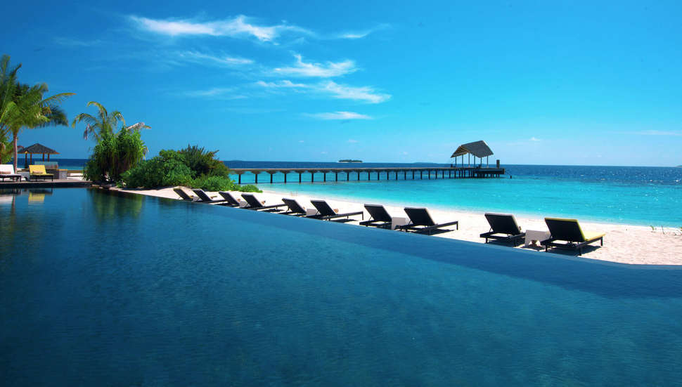 Een foto van het strand bij NH Collection Maldives Havodda Resort