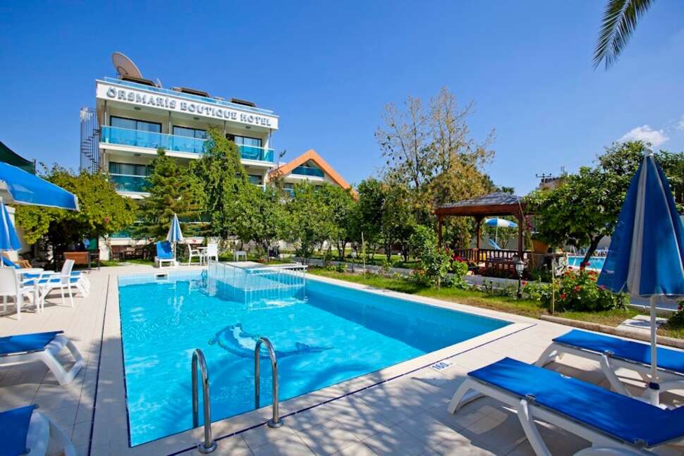 Een foto van het zwembad bij Orsmaris Boutique Hotel