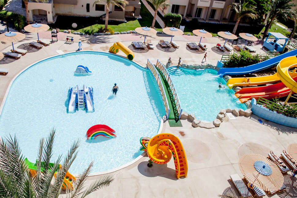 Een foto van het zwembad bij El Karma Aqua Beach Resort