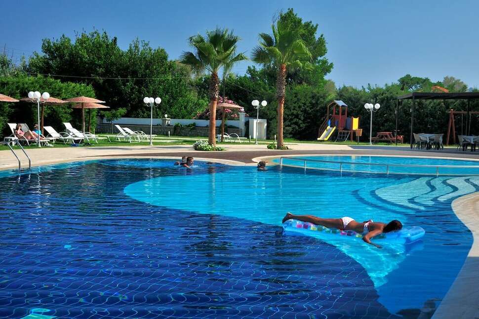 Een foto van het zwembad bij Afandou Bay Resort Suites
