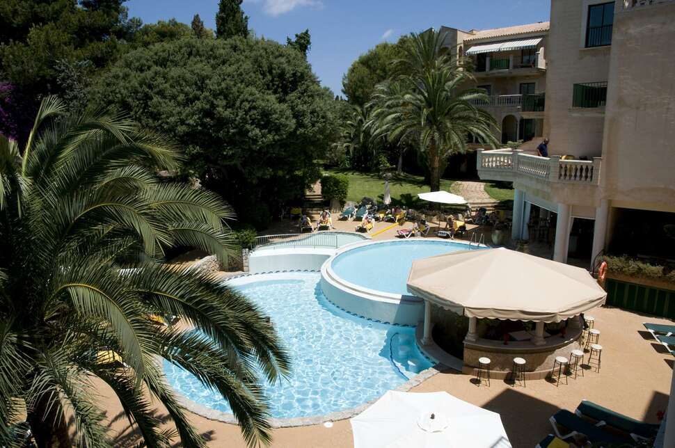 Een foto van het zwembad bij Hotel Lago Garden Suites & Spa