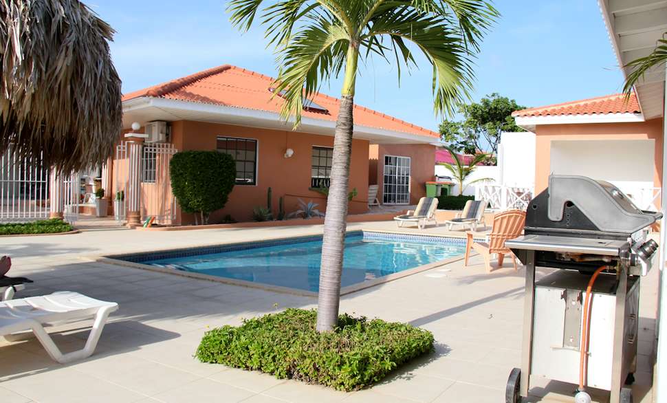 Een foto van het zwembad bij Curinjo Resort