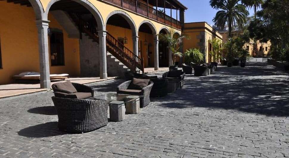 Een foto van het terras bij La Hacienda del Buen Suceso