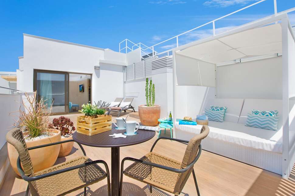 Een foto van het terras bij Sumus Hotel Stella & Spa