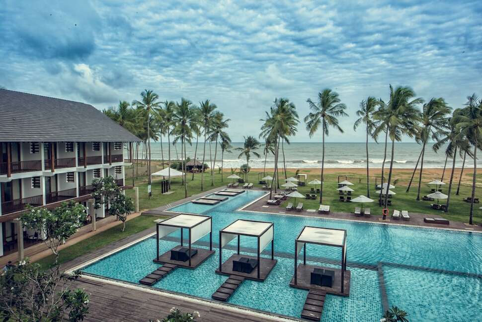 Een foto van het zwembad bij Suriya Luxury Resort