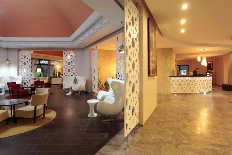 Een foto van het interieur van Kenzi Europa Hotel