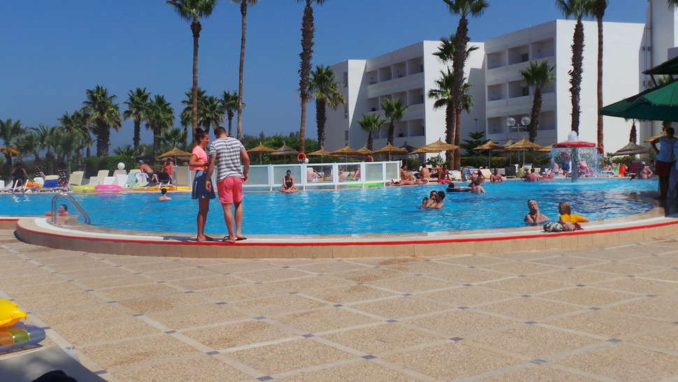 Een foto van het zwembad bij Hotel Club Tropicana & Spa