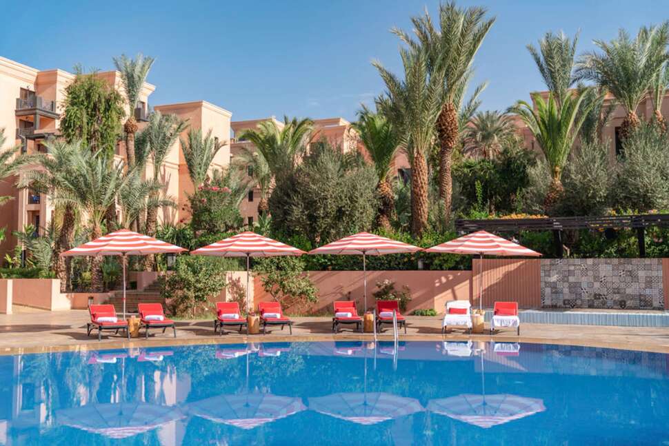 Een foto van het zwembad bij Mövenpick Hotel Mansour Eddahbi Marrakech