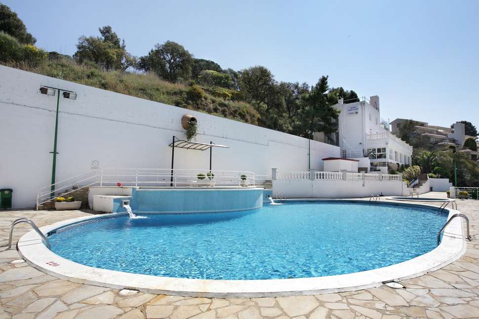 Een foto van het zwembad bij Hotel Don Juan Tossa