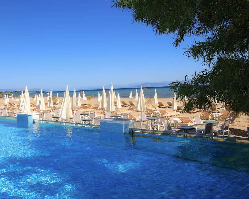 Een foto van het zwembad bij Cavomarina Beach Hotel