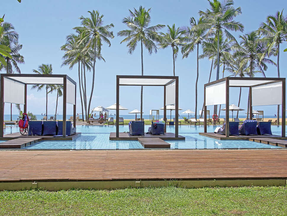 Een foto van het zwembad bij Suriya Luxury Resort