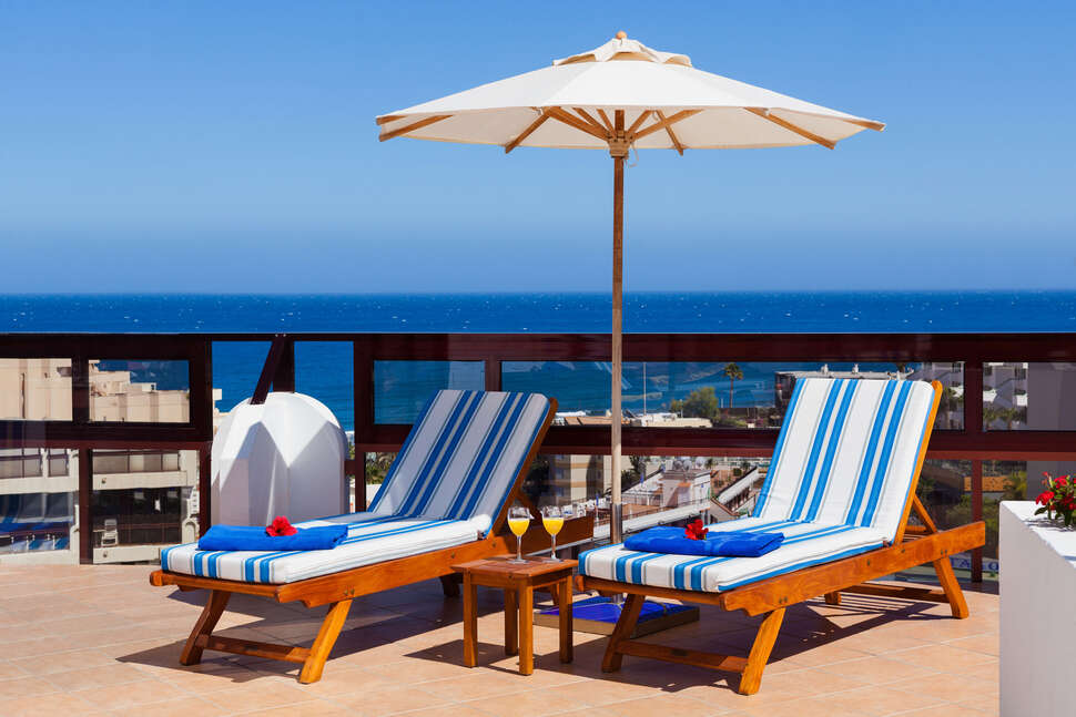 Een foto van het terras bij Seaside Sandy Beach