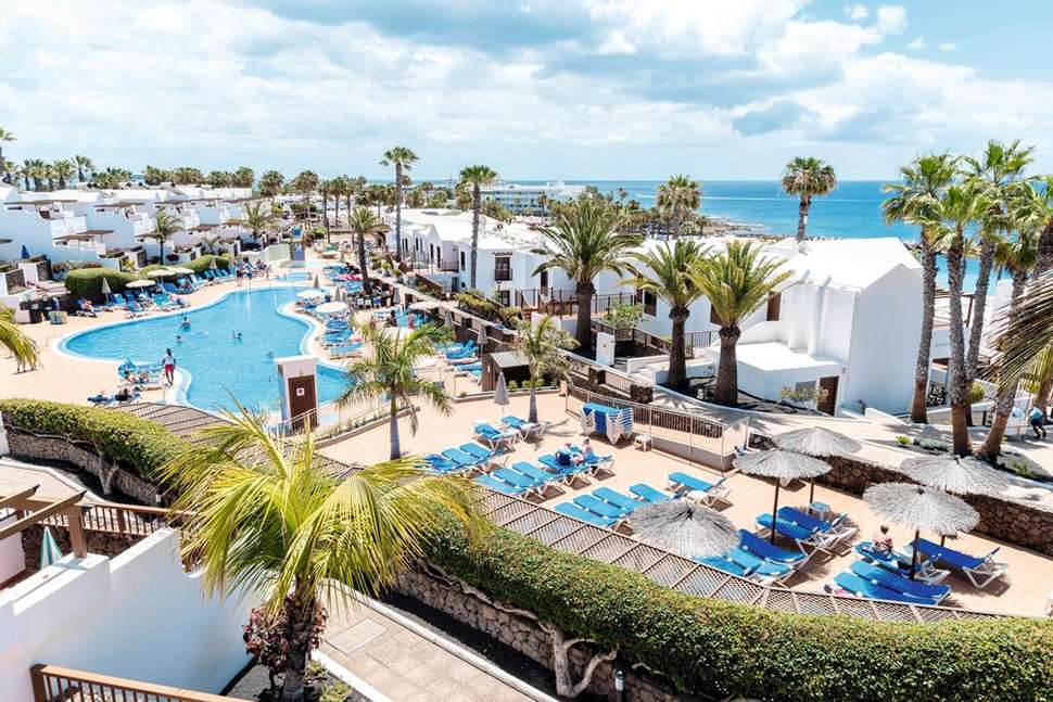 Een foto van het zwembad bij Flamingo Beach