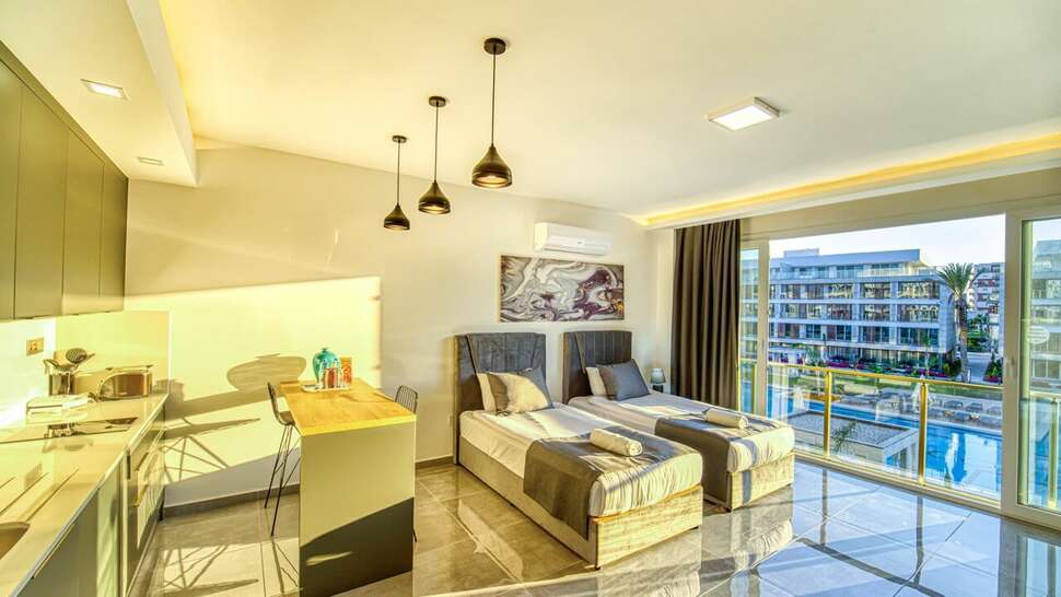 Ein Foto Courtyard Long Beach Holiday Resort