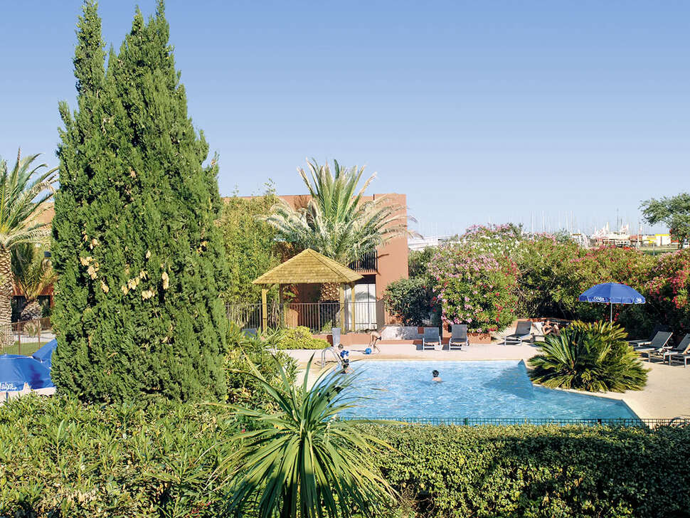 Een foto van het zwembad bij Odalys Residence du Golfe