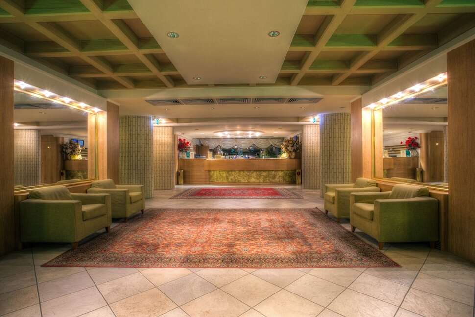 Een foto van het interieur van Club Hotel Dante
