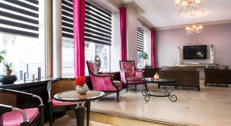 Een foto van het interieur van Hotel Corona Rodier