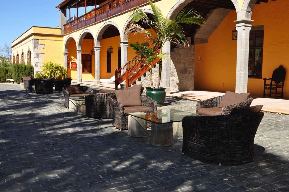Een foto van het terras bij La Hacienda del Buen Suceso