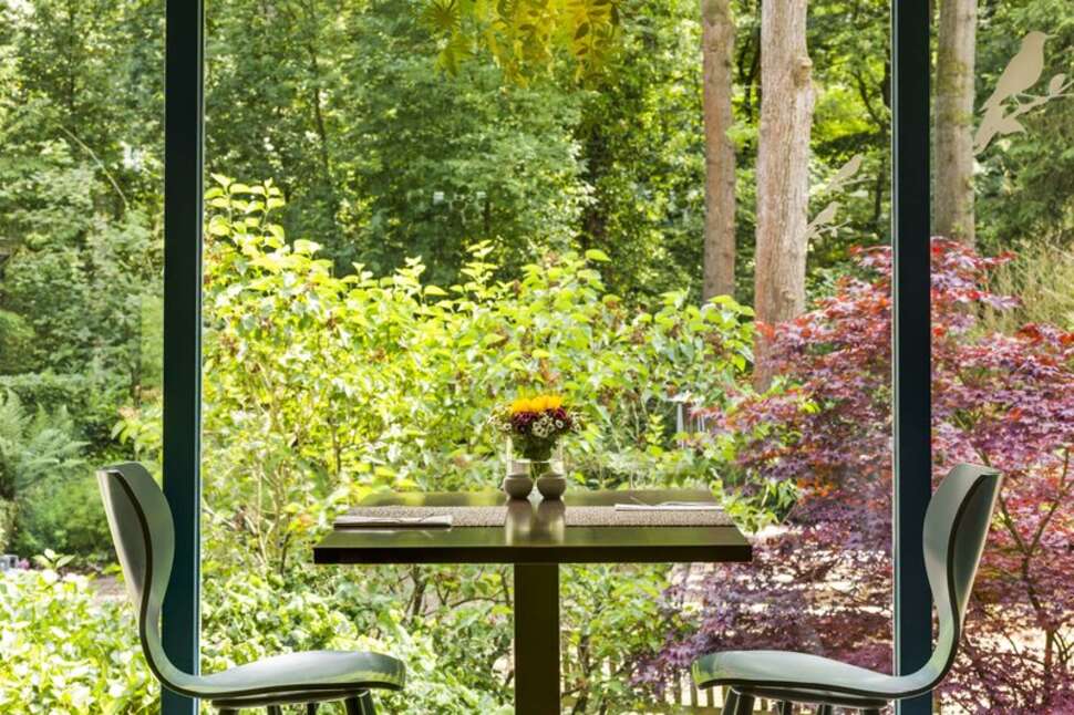 Een foto van het terras bij Fletcher Hotel Restaurant Sparrenhorst Veluwe