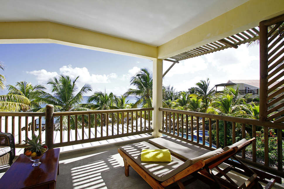 Een foto van het terras bij Hibiscus Boutique Hotel