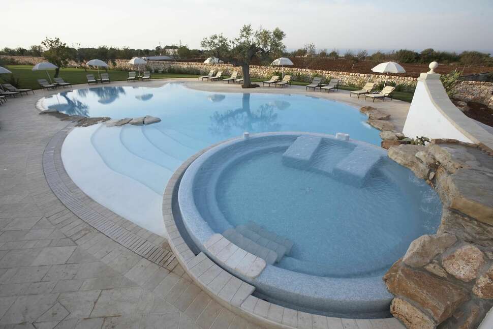 Ein Foto vom Pool im Borgobianco Resort & Spa