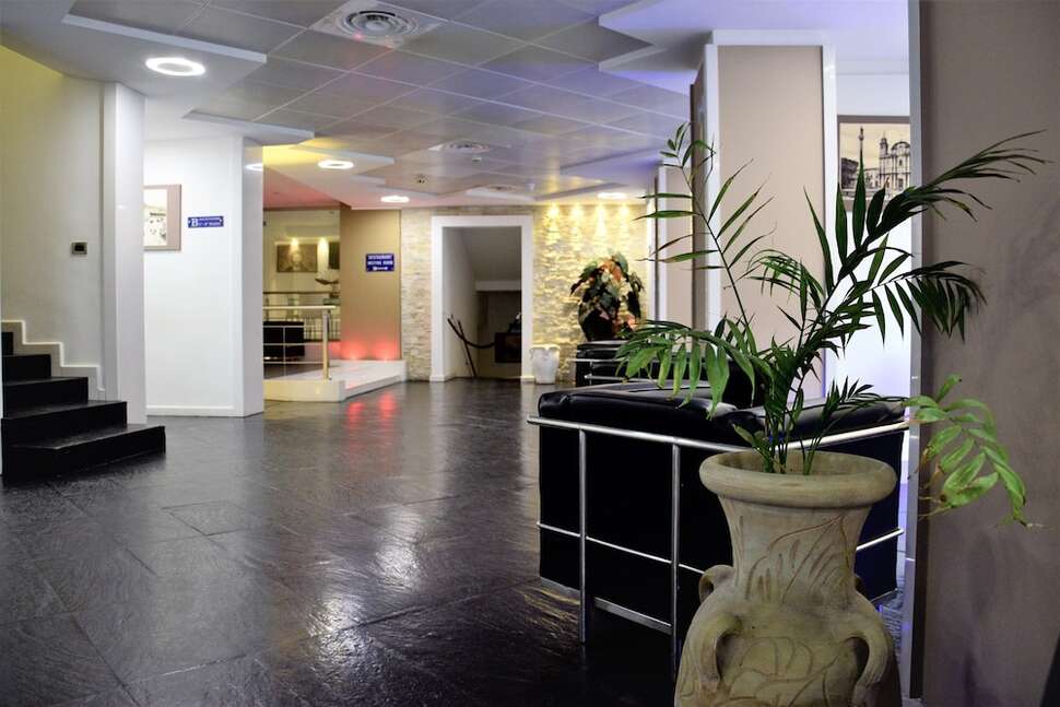 Een foto van het interieur van Ibis Styles Palermo Cristal