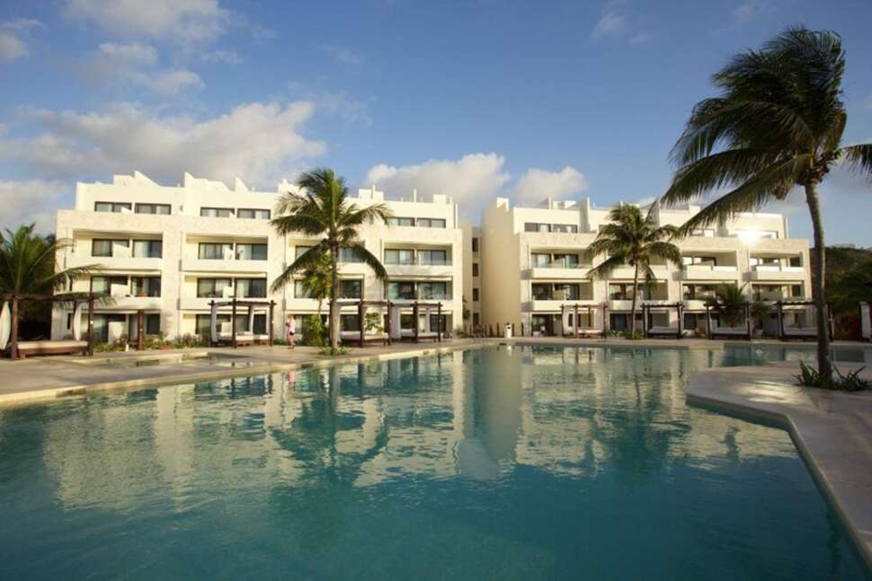 Een foto van het zwembad bij Akumal Bay Beach & Wellness Resort