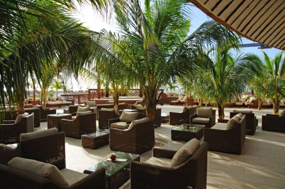 Een foto van het terras bij Lamantin Beach Hotel Resort & Spa