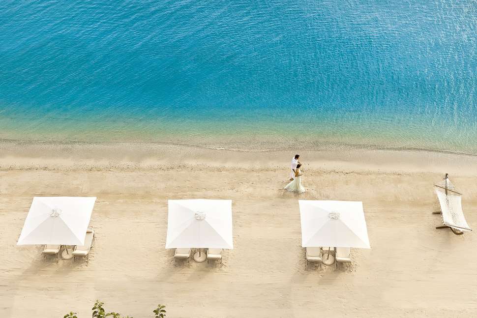 Een foto van het strand bij Ikos Dassia