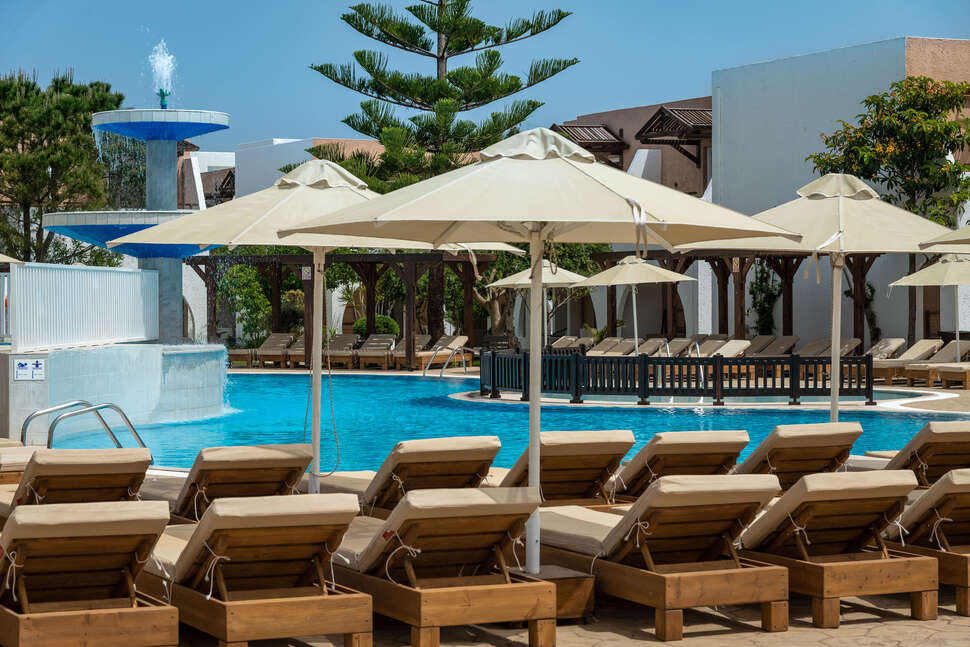 Een foto van het zwembad bij Gaia Village Hotel