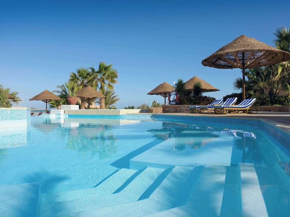 Een foto van het zwembad bij Mövenpick Resort El Quseir