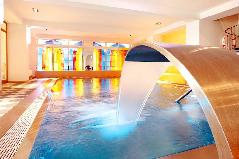 Een foto van het zwembad bij Berger's Sporthotel