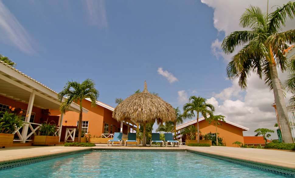 Een foto van het zwembad bij Curinjo Resort