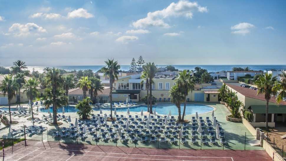 Een foto van het zwembad bij Marinda Garden