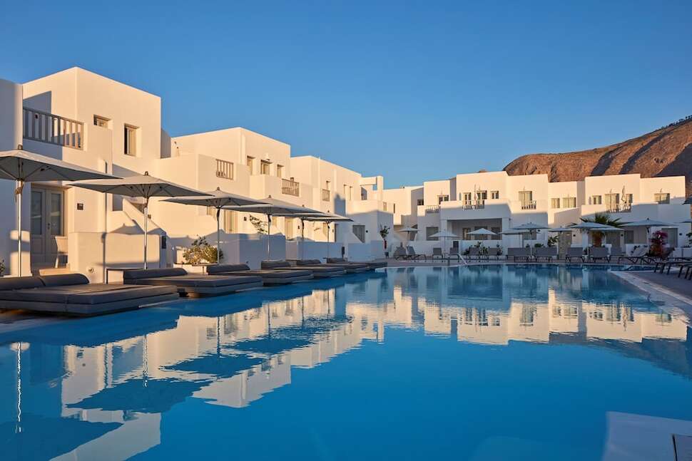 Een foto van het zwembad bij Aqua Blue Hotel