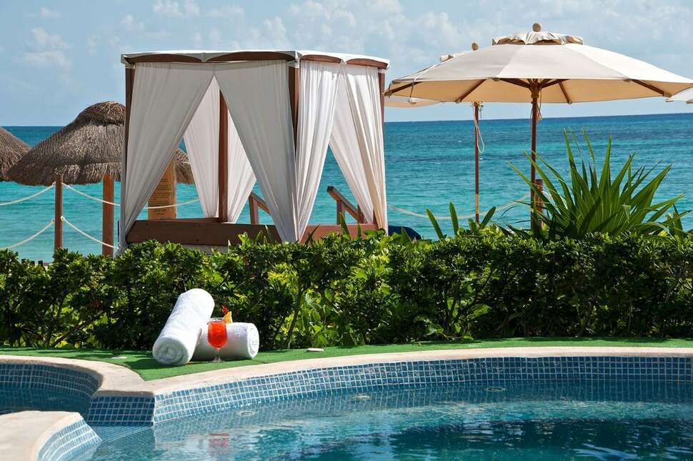 Een foto van het zwembad bij The Reef Coco Beach