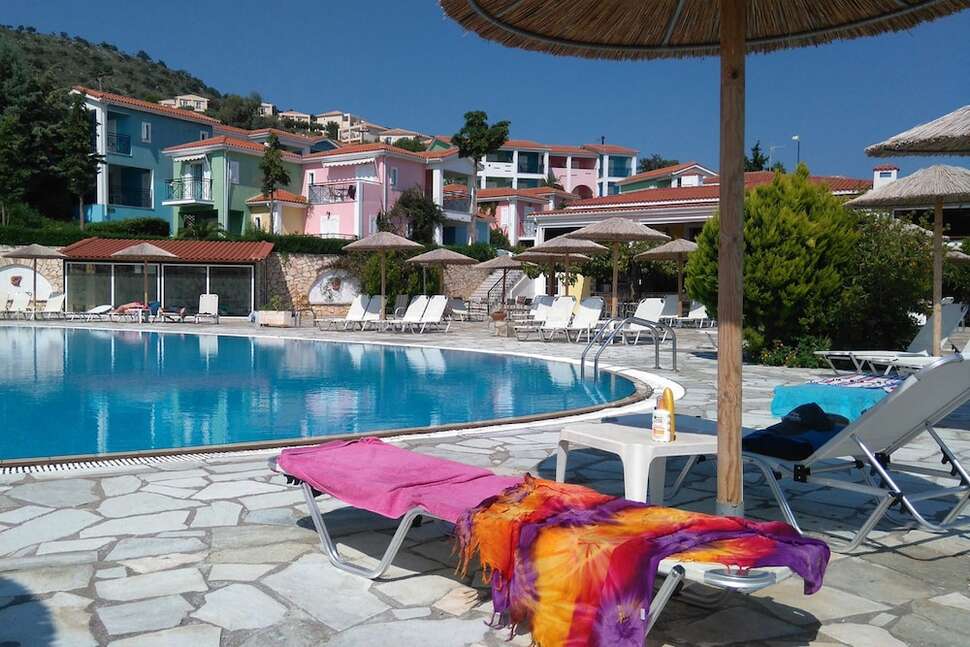 Een foto van het zwembad bij Porto Skala Hotel