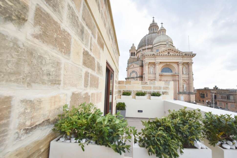 Een foto van de buitenkant van Quaint Boutique Hotel Xewkija
