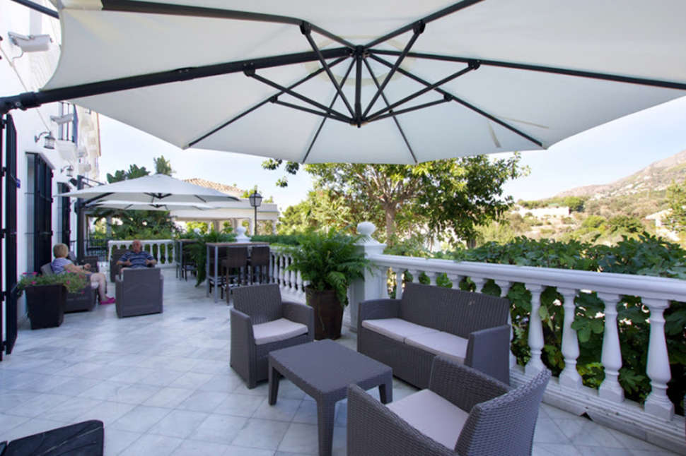 Een foto van het terras bij Ilunion Hacienda de Mijas