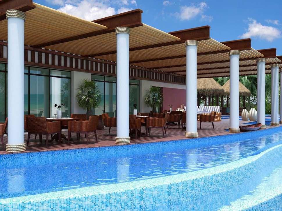 Een foto van het terras bij The Fives Beach Hotel & Residences