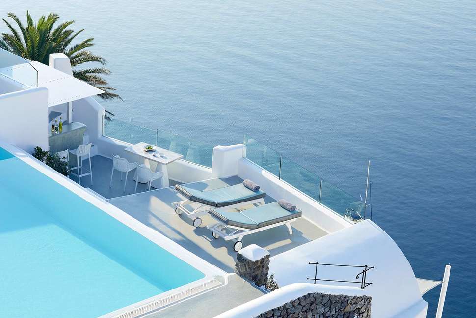 Een foto van het zwembad bij La Perla Villas & Suites