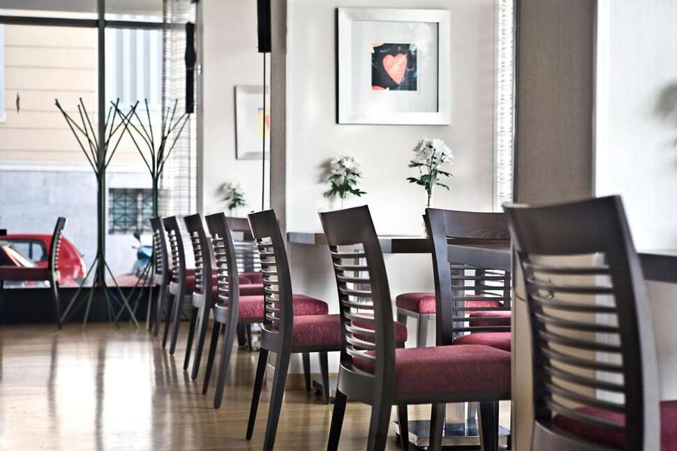 Een foto van het interieur van Amalia Hotel Athens