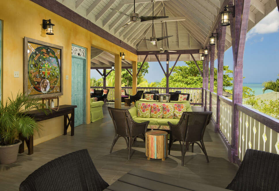 Een foto van het terras bij Country Country Beach Cottages