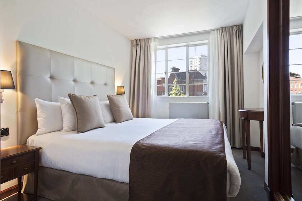 Ein Foto Melia White House Hotel Apartments