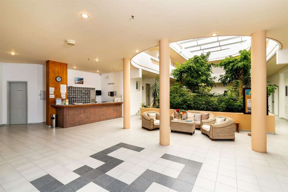 Een foto van het interieur van Sabina Hotel