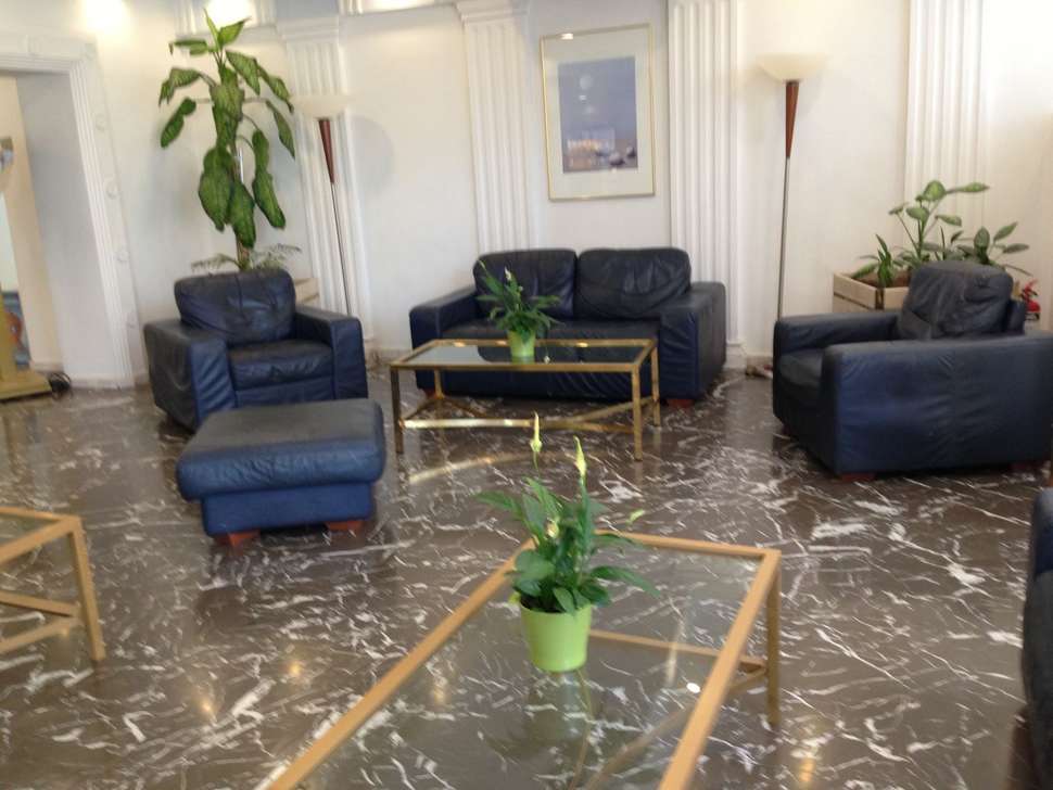 Een foto van het interieur van Candia Hotel